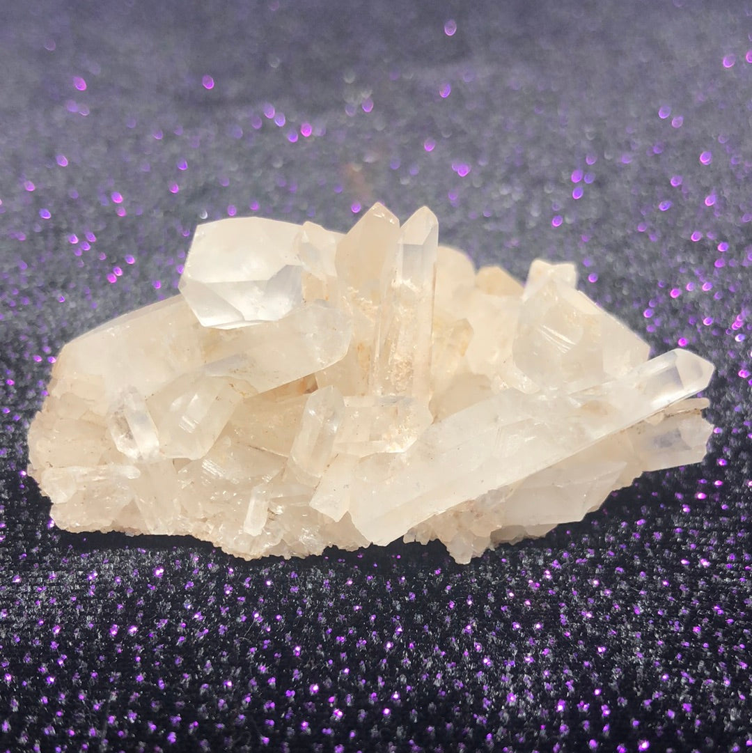 Raw clear quartz cluster